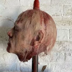 Burkbench Designs Silicone Severed Head On Spike Jud -Halloween Gear Sales 2 severed silicone head on stake horror prop